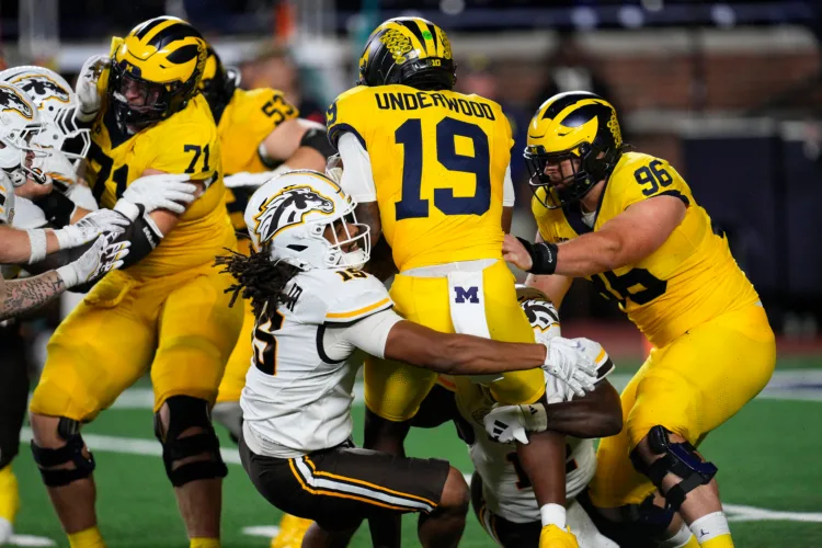 Michigan coach Kyle Whittingham says Bryce Underwood has to improve to keep his job as QB 1